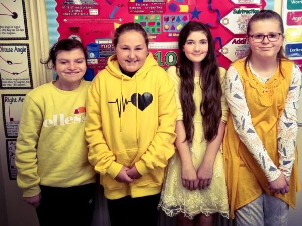 Learners at Orchard Education school in Grimsby, wearing yellow for Mental Health Awareness.