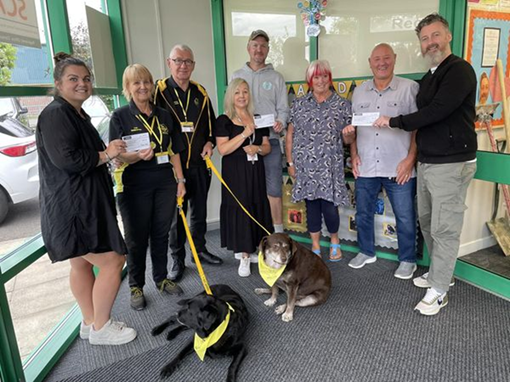Staff from Orchard Education in Grimsby, handing over a cheque to the Grimsby Food Kitchen, Therapy Dog Nationwide and The Canoe Guy. All funds raised by learners from the Special Educational Needs school at Enterprise day.