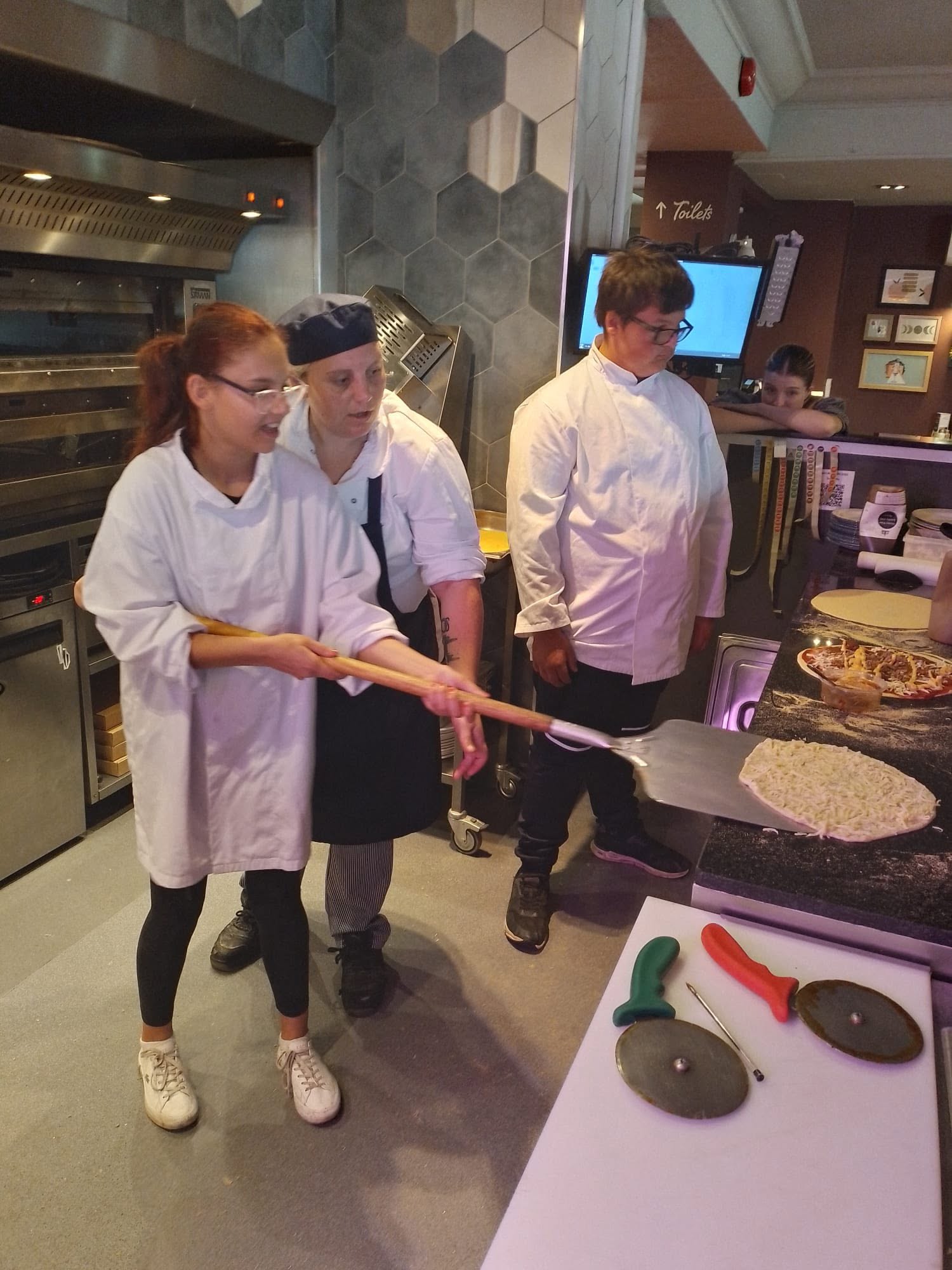 Learners in both Key Stage 3 and Key Stage 4 take part in meaningful work experience opportunities. Here, a learner is developing valuable employability and independence skills during a placement at Stonehouse Hull.